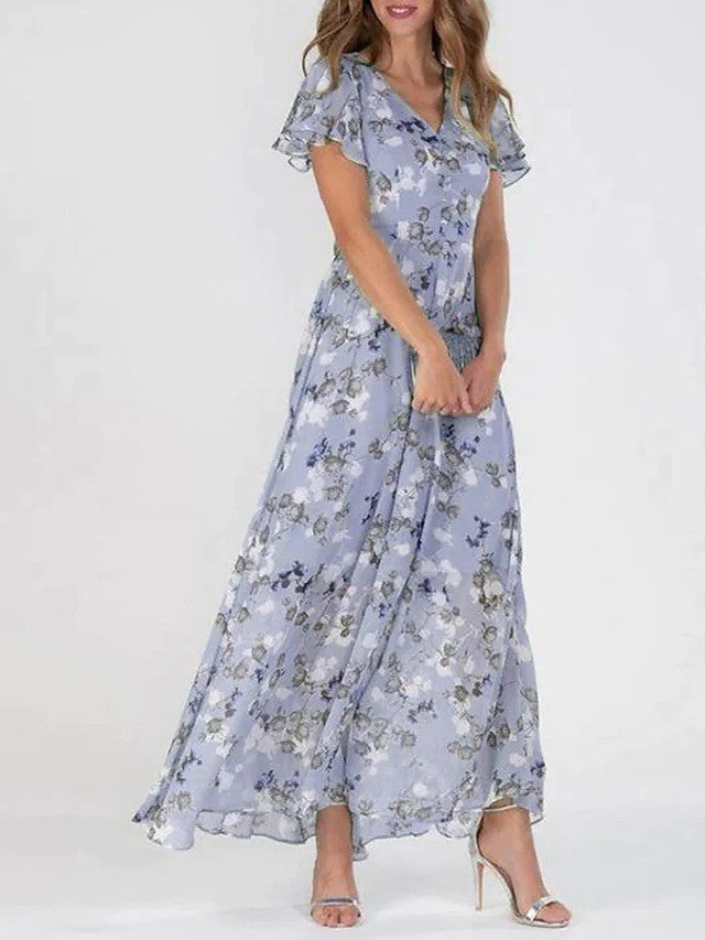 Judith – Modieuze print jurk met taille