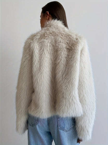 Giacca da donna in pelliccia sintetica beige con fibbie e collo alto