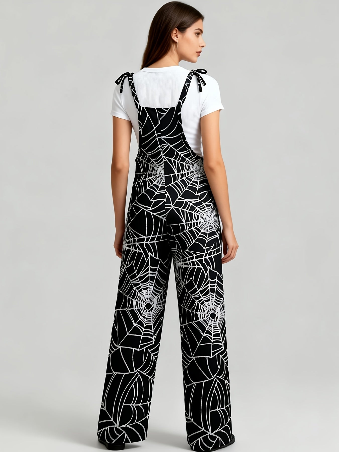 Damen Jumpsuit Spinnennetz-Muster Schwarz Trägerhose