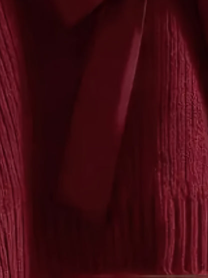 Pullover da donna in maglia grossa con scollo a V e grande fiocco
