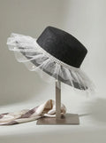 Zonnehoed voor dames met tule en parelversiering