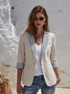 Gestreepte blazer voor dames met lange mouwen, zakken en knopen
