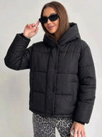 Oversized gewatteerde jas voor dames met capuchon en ingewerkte zakken